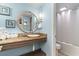 Bathroom with vanity, sink, and shower/tub combo at 6900 N Ocean Blvd. # 841, Myrtle Beach, SC 29572