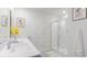 Clean bathroom with a double vanity, large mirror, and walk-in shower at 724 Wallace Dr., Little River, SC 29566
