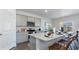 Modern kitchen with gray cabinets, granite countertops, and an island at 724 Wallace Dr., Little River, SC 29566