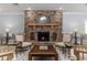 Inviting lobby with a large stone fireplace and comfortable seating at 724 Wallace Dr., Little River, SC 29566