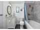 Bathroom with a tub, shower, and white vanity at 817 Wayne St., North Myrtle Beach, SC 29582