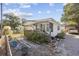 Single story home with covered porch and landscaping at 817 Wayne St., North Myrtle Beach, SC 29582