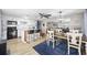 Open concept kitchen and dining area with an island and wooden dining table at 817 Wayne St., North Myrtle Beach, SC 29582