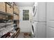 Laundry room with washer, dryer, and ample storage at 817 Wayne St., North Myrtle Beach, SC 29582