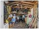 Full storage shed with various tools and equipment at 817 Wayne St., North Myrtle Beach, SC 29582