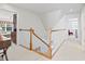 Upstairs hallway with staircase and access to bedrooms at 1044 Martin Ln., Conway, SC 29526