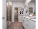 Elegant bathroom with double vanity, large shower, and walk-in closet at 1212 Arizona Dr., Longs, SC 29568