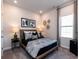Spacious bedroom with wood bed frame and stylish decor at 1212 Arizona Dr., Longs, SC 29568