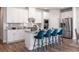 Modern kitchen featuring white cabinetry, granite countertops, and stainless steel appliances at 1212 Arizona Dr., Longs, SC 29568