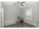 Small bedroom with dark wood floors and a window at 124 S Shore Blvd. # 301, Longs, SC 29568