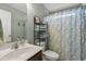 Bathroom with shower/tub combo and built-in shelving at 166 Woodland Park Loop, Murrells Inlet, SC 29576