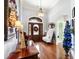 Bright entryway with hardwood floors, bench, and decorative accents at 201 Deep Blue Dr., Myrtle Beach, SC 29579