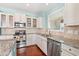 Updated kitchen featuring granite countertops and stainless steel appliances at 2017 Silver Spring Ln., Myrtle Beach, SC 29577