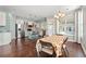 Open concept kitchen with island, stainless steel appliances, and dining area at 2017 Silver Spring Ln., Myrtle Beach, SC 29577