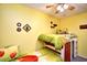 Bright bedroom with a twin-over-twin bunk bed and cheerful decor at 212 29Th Ave. N # 210, North Myrtle Beach, SC 29582