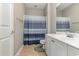 Bathroom with shower/tub combo and white vanity at 2740 Bayboro St., Loris, SC 29569