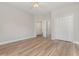 Bedroom with hardwood floors, double doors to en-suite bathroom at 2740 Bayboro St., Loris, SC 29569