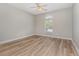 Bright bedroom with hardwood floors and ceiling fan at 2740 Bayboro St., Loris, SC 29569