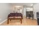 Living room features hardwood floors, plaid sofa, and glass coffee table at 2740 Bayboro St., Loris, SC 29569