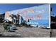 Large mural depicting beach scene in Surfside Beach, South Carolina at 423 Ocean Palms Dr., Surfside Beach, SC 29575