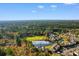 Aerial view of community, featuring a golf course and pond at 4645 Fringetree Dr. # H, Murrells Inlet, SC 29576