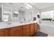 Double vanity bathroom with a soaking tub and large mirror at 4645 Fringetree Dr. # H, Murrells Inlet, SC 29576