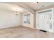 Dining room with tiled floor, chandelier and view to the entryway at 517 Miromar Way, Myrtle Beach, SC 29588