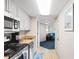 Open kitchen with stainless steel appliances and light wood cabinets at 5200 N Ocean Blvd. # 1033, Myrtle Beach, SC 29577