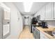 Well-equipped kitchen with stainless steel appliances and light wood cabinets at 5200 N Ocean Blvd. # 1033, Myrtle Beach, SC 29577