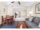 Open living area with sofa, dining table, and a view into the kitchen at 5200 N Ocean Blvd. # 1033, Myrtle Beach, SC 29577