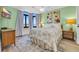 Cozy bedroom with a queen-size bed and calming decor at 5910 N Ocean Blvd. # 504, North Myrtle Beach, SC 29582