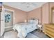 Tranquil bedroom with a queen bed and calming decor at 5910 N Ocean Blvd. # 504, North Myrtle Beach, SC 29582