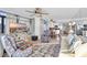 Bright living room with comfy seating, large TV, and ocean view at 5910 N Ocean Blvd. # 504, North Myrtle Beach, SC 29582