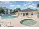 Relaxing pool and hot tub area with lounge chairs at 601 Hillside Dr. N # 4023, North Myrtle Beach, SC 29582