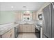 Modern kitchen featuring granite countertops and stainless steel appliances at 6028 Andros Ln., Murrells Inlet, SC 29576