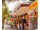 Bustling street scene with various shops and pedestrians at 727 Isle Verde Dr, Myrtle Beach, SC 29579