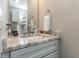 Bathroom with granite countertop and modern vanity at 101 S Barnwell St. # 38-A, North Myrtle Beach, SC 29582