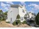 Side view of townhome showcasing landscaping and exterior features at 101 S Barnwell St. # 38-A, North Myrtle Beach, SC 29582