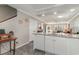 Kitchen with granite countertops, white cabinets, and island at 101 S Barnwell St. # 38-A, North Myrtle Beach, SC 29582