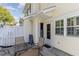 Private patio with table and chairs at 101 S Barnwell St. # 38-A, North Myrtle Beach, SC 29582