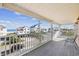 Covered balcony overlooking the street and ocean views at 1050 Waccamaw Dr., Garden City Beach, SC 29576