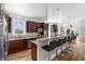 Open concept kitchen with granite countertops and stainless steel appliances at 1050 Waccamaw Dr., Garden City Beach, SC 29576