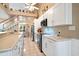 Modern kitchen with white cabinets and ample counter space at 110 Club Circle, Pawleys Island, SC 29585