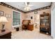 Home office with built-in shelving and adjacent bathroom at 110 Club Circle, Pawleys Island, SC 29585