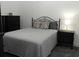 Bedroom with full bed, nightstand, and dresser at 1100 Commons Blvd. # 507, Myrtle Beach, SC 29572