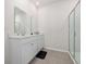 Bathroom with double vanity, large mirror, and a walk-in shower at 1143 Sennema Circle, Myrtle Beach, SC 29588
