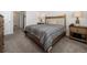 Bedroom with wood bed frame and carpeting, offering a peaceful atmosphere at 1143 Sennema Circle, Myrtle Beach, SC 29588