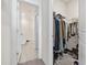 Walk-in closet with ample hanging and shoe storage at 1143 Sennema Circle, Myrtle Beach, SC 29588