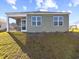 Gray house exterior with screened porch at 1143 Sennema Circle, Myrtle Beach, SC 29588