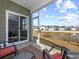 Relaxing screened porch overlooking a pond and neighborhood at 1143 Sennema Circle, Myrtle Beach, SC 29588